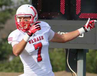 Jon Laird celebrates his 64-yard TD reception