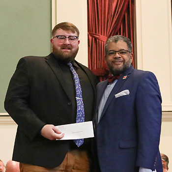 Lewter with Dean Steven Jones at the 2026 Awards Chapel, where Lewter was presented with the Malcolm X Institute Service Award