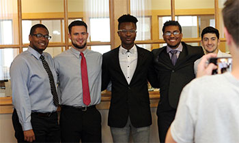 (from left) WLAIP participants Davionne Garrett '22, Ali Hakim '22, Anthony Williams '20, Gerald Randle '22, and Emiliano Delgado '22 pose for a picture just about to be taken at the 2018 Audio Essay listening party.