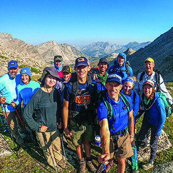 Center front: Brian ’97 and Isaac Kerr; back right: Andrew ’99 and Isabel Arnold on the seven-day, seven-night Father Family trip on Temple Peak Pass, Wind River Range, Wyoming, Summer 2021. 