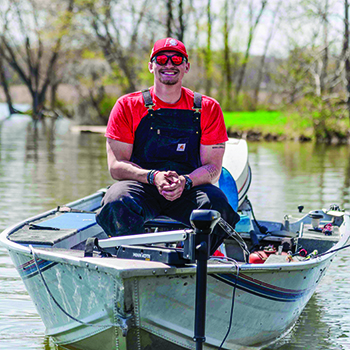 Matt Lepper &rsquo;25 enjoys a spring day in his boat at Lake Waveland