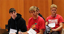 Bryce Kinnaman &rsquo;26 (center) listens to a classmate during the in-class role-playing game &ldquo;Reacting to the Past.&rdquo;