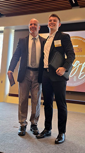 Chase (right) is pictured with Jeremy Lowery, a physical education teacher and football coach at West Washington Jr./Sr. High School.