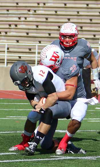 Cody Buresh with the first of two sacks.