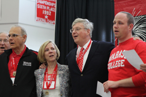 Bruce Polizotto ’63, Chris White H’07, Pat White H’10, and Jesse James ’08 sing Alma Mater.