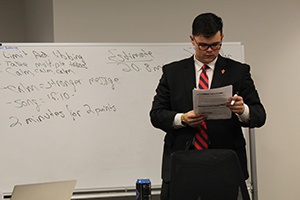 Daniel Bass ’22 takes notes while tracking the timing, strengths, weaknesses and any changes that may need to be made to each speech for the upcoming TEDx event.