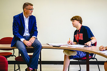 The Princeton Review gave Wabash College strong marks for professor accessibility and classroom experience. Professor of Psychology Bobby Horton chats with an incoming student during June’s orientation programming.