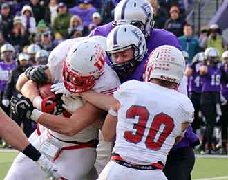 Tyler McCullen with an interception on the line.