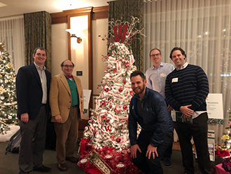 Noteworthy alumni pose with the Wabash Tree.