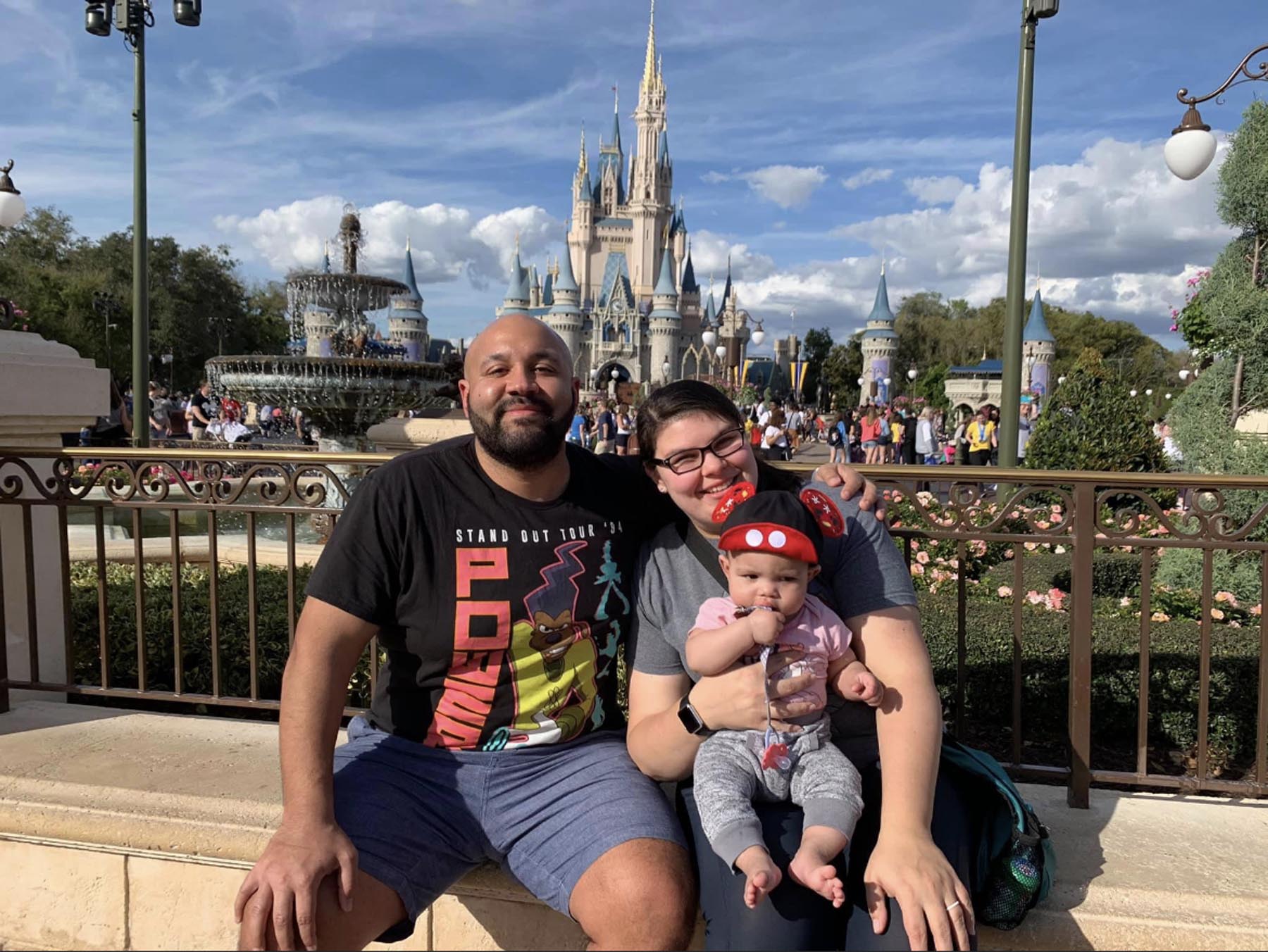 Alex DeLonis with his wife, Kelsey, and their 1-year-old daughter.