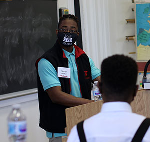 Micah Walker '21 takes questions from the audience following his reading.