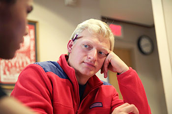 Lange works with a student at the Writing Center.