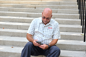 Harris on the steps of the Allen Center