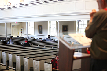Students spread out for class in the Chapel