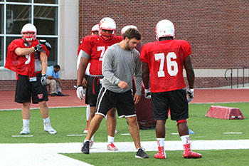 Janak works one-on-one with a player.