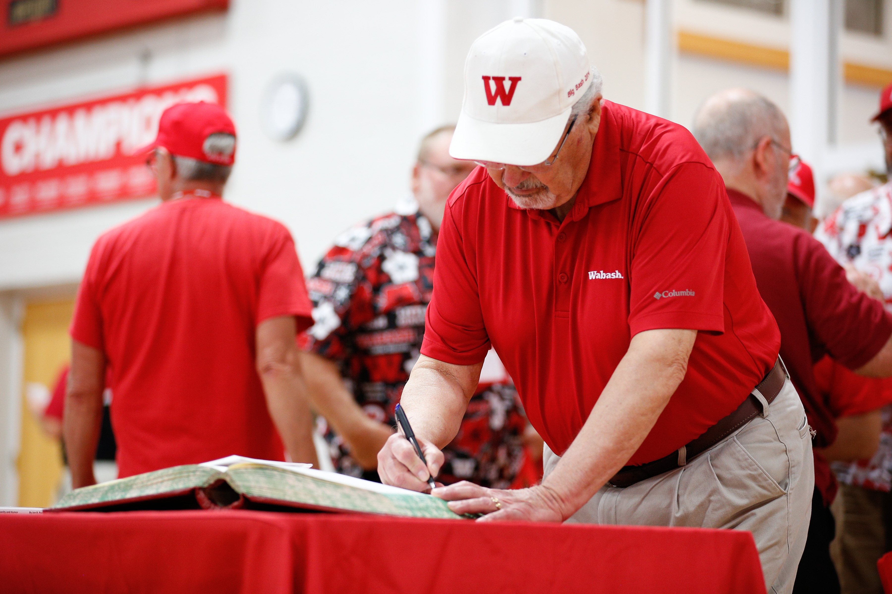 Attendees permanently record their attendance at Big Bash in the official Alumni Register.