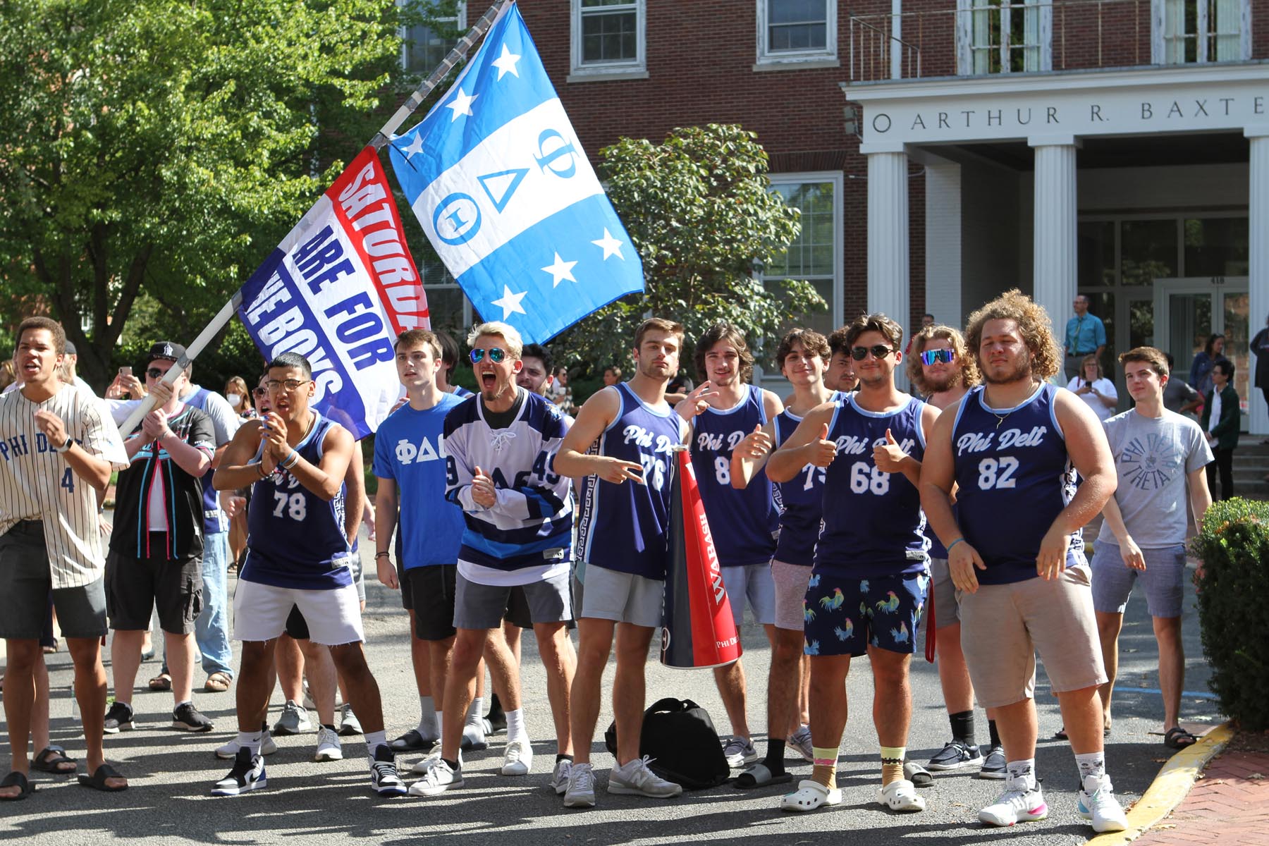 Rippy cheers on Phi Delta Theta’s pledge class with his fraternity brothers during the 2021 Chapel Sing.