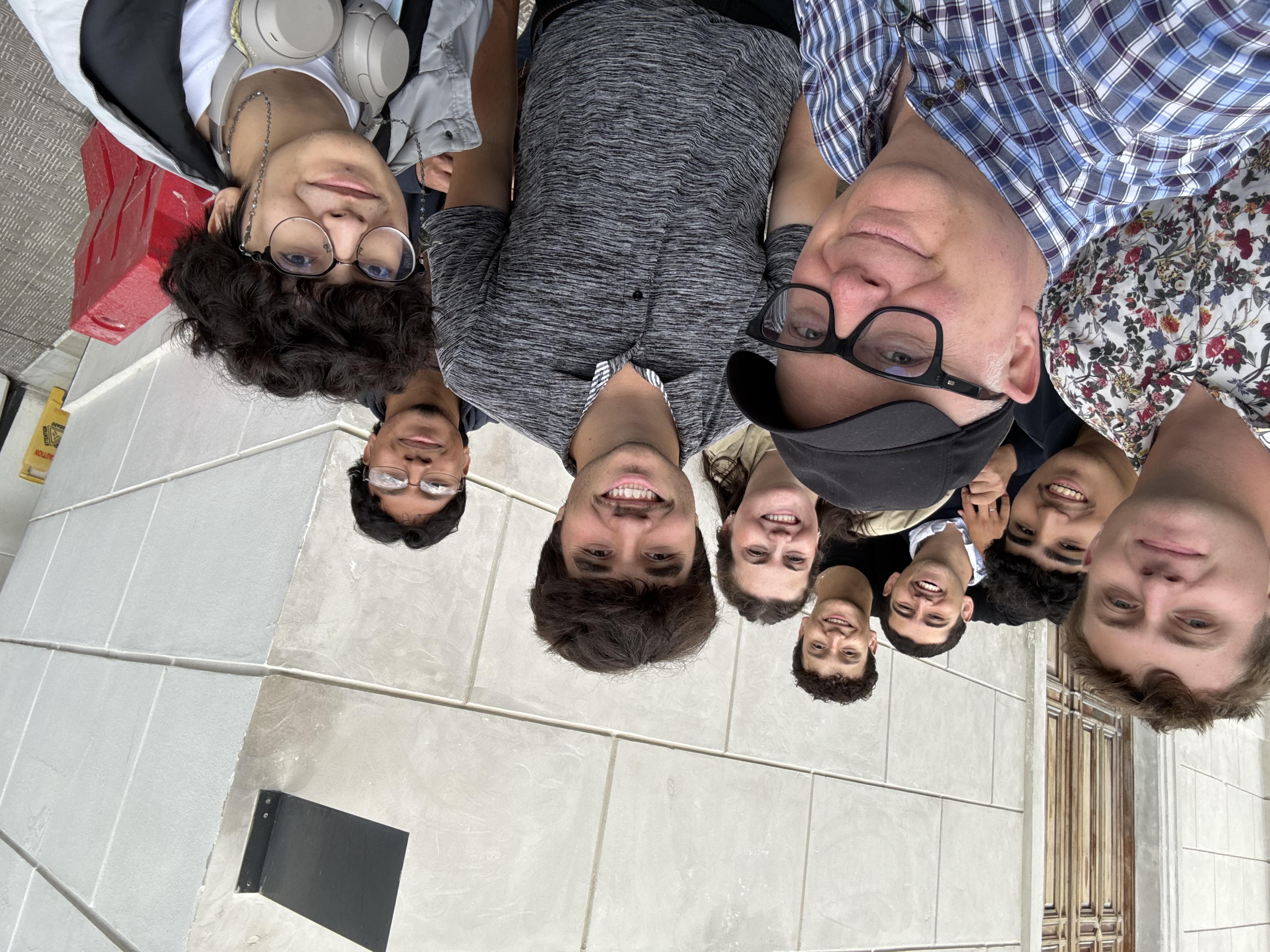The group snaps a selfie with Grandinetti's friends from home.
