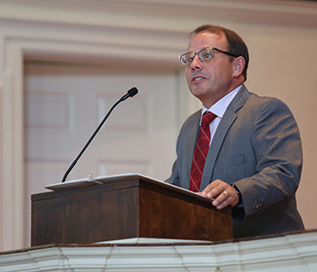 President Scott Feller speaks at Ringing In