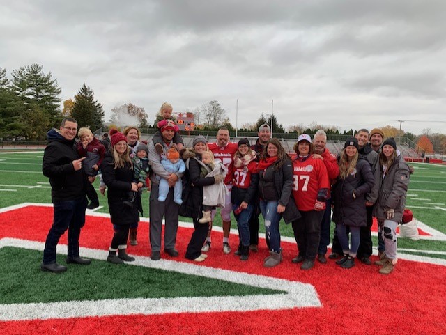 The Buresh family together at their last Monon Bell game cheering on Seth ’22.