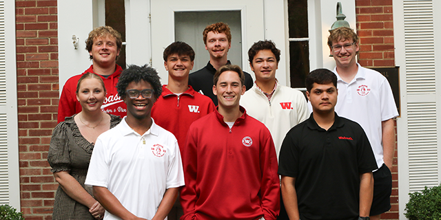 a group of people posing for a photo
