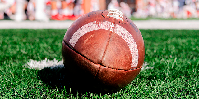 A football on the sideline