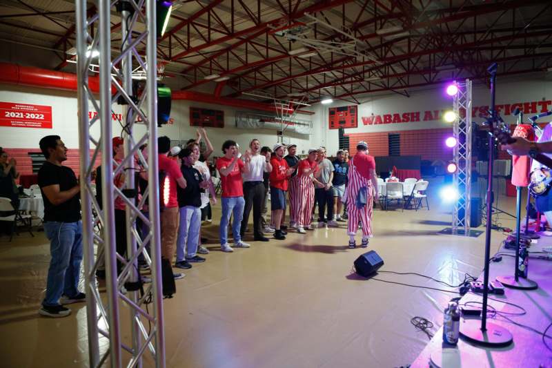 a group of people standing on a stage