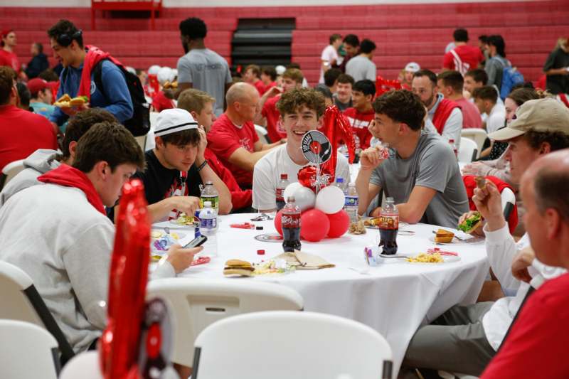 a group of people sitting around a table