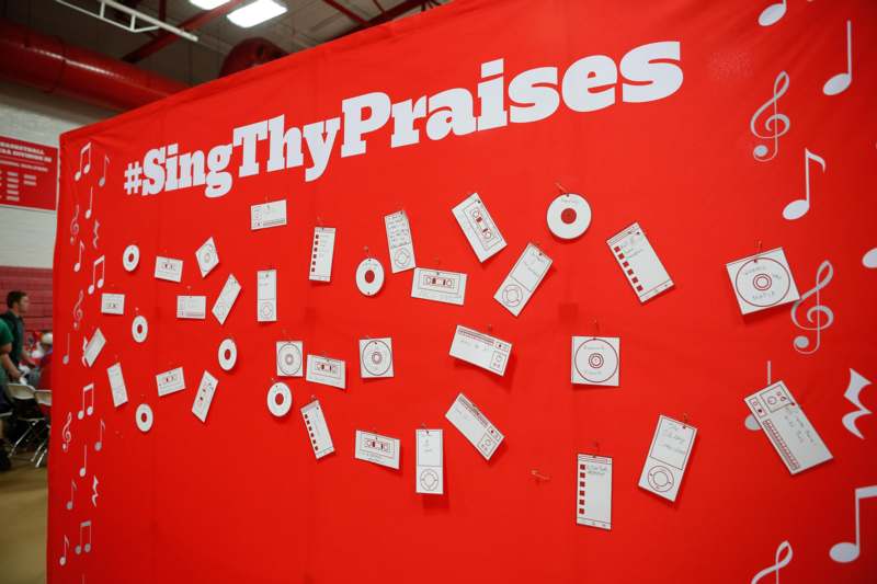 a red banner with white text and white letters