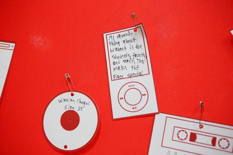 a paper disc with a paper clip attached to it