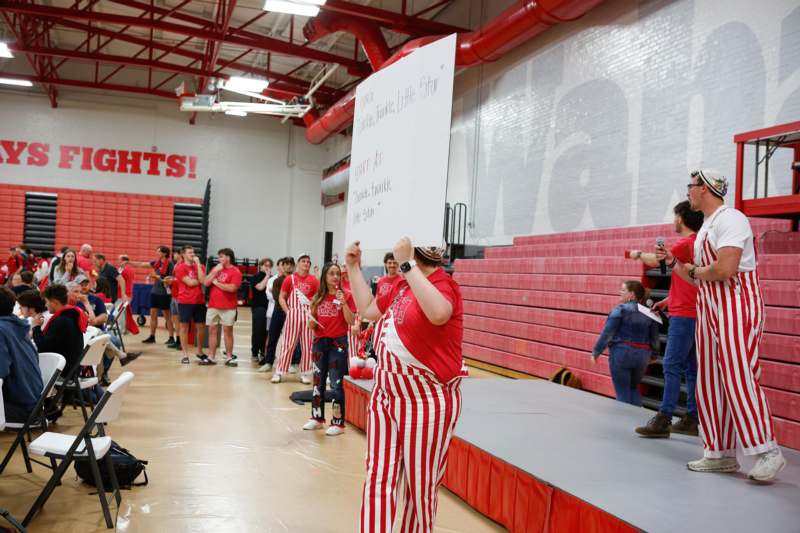 a group of people in a gym