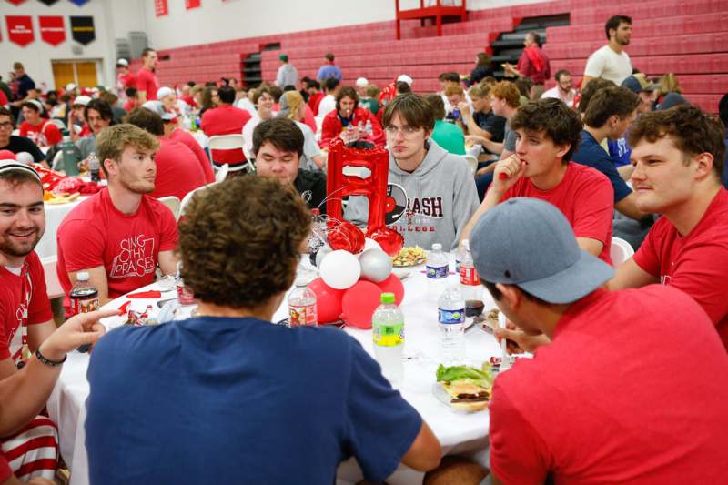 a group of people sitting at a table