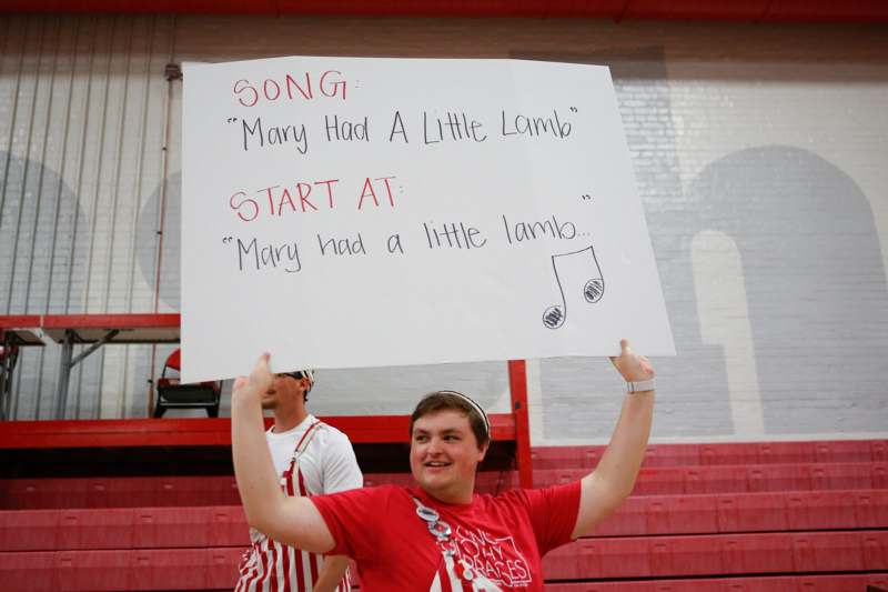 a man holding a sign