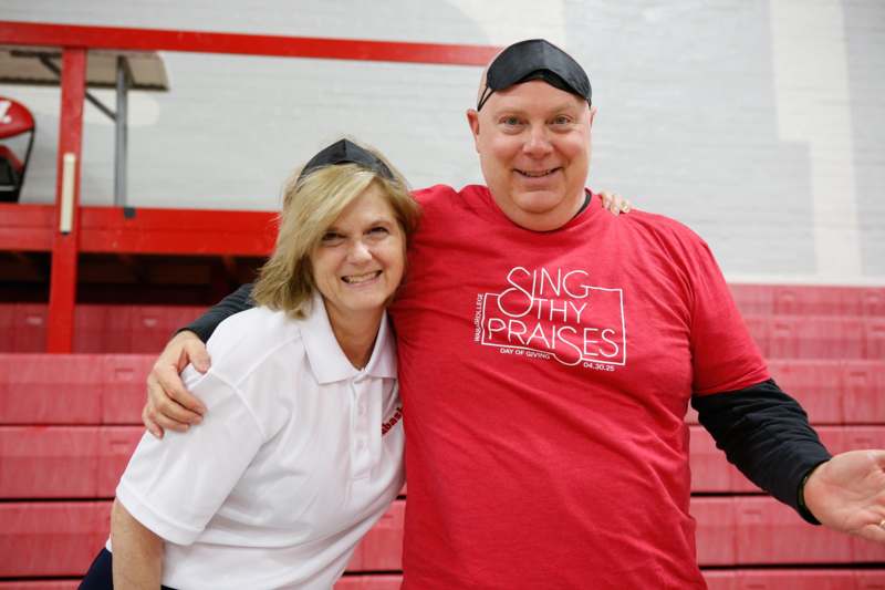 a man and woman smiling for a picture