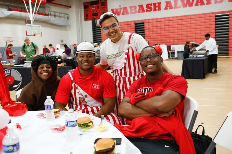 a group of people sitting at a table