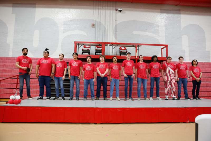 a group of people standing on a stage