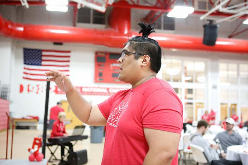 a man in a red shirt
