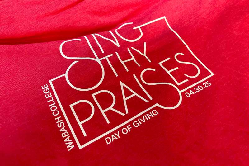 a red shirt with white text