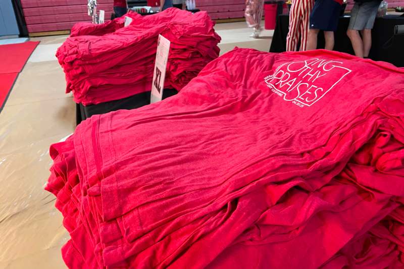 a stack of red blankets