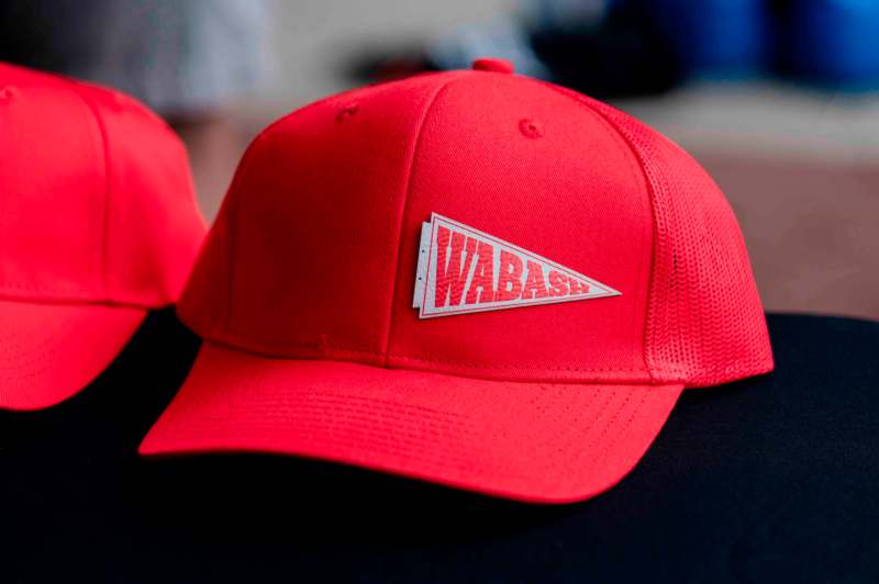 a red hat with a logo on it