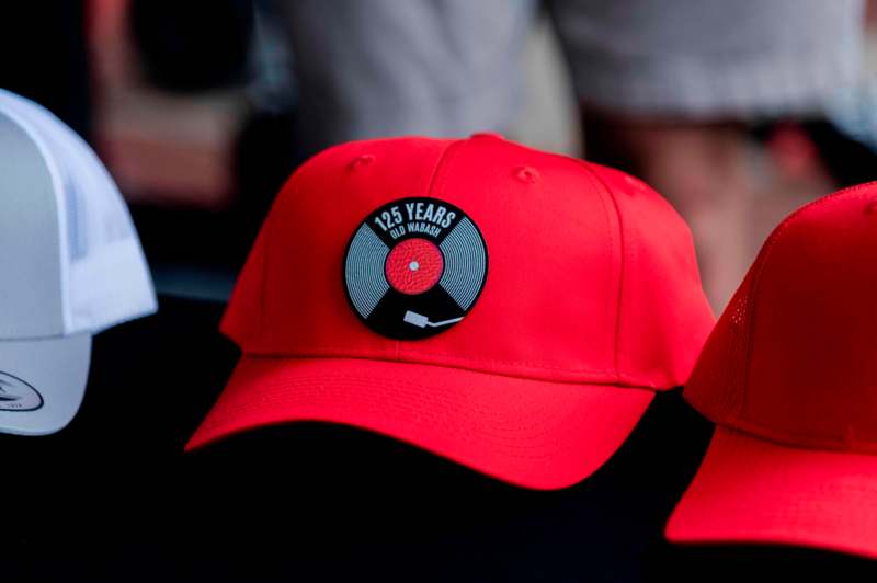 a red hat with a logo on it