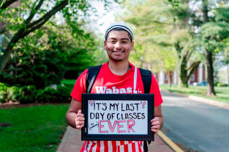 a man holding a sign