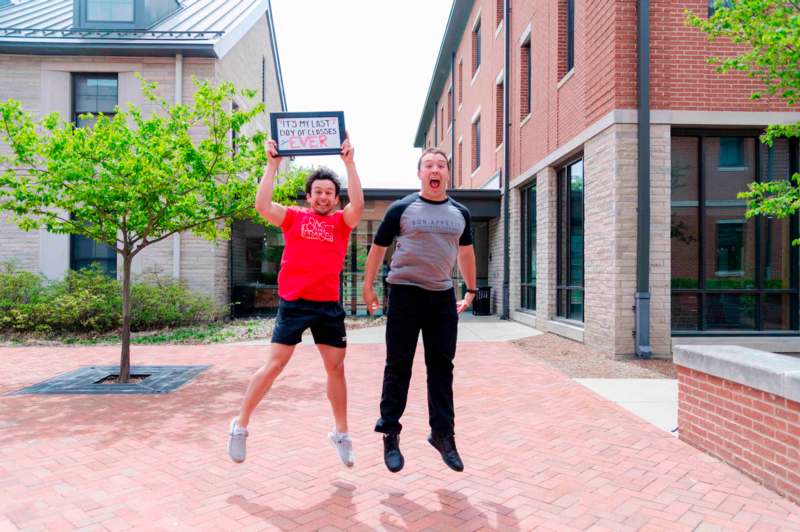 two men jumping in the air