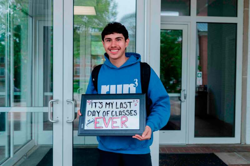 a man holding a sign