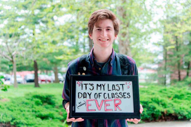 a man holding a sign