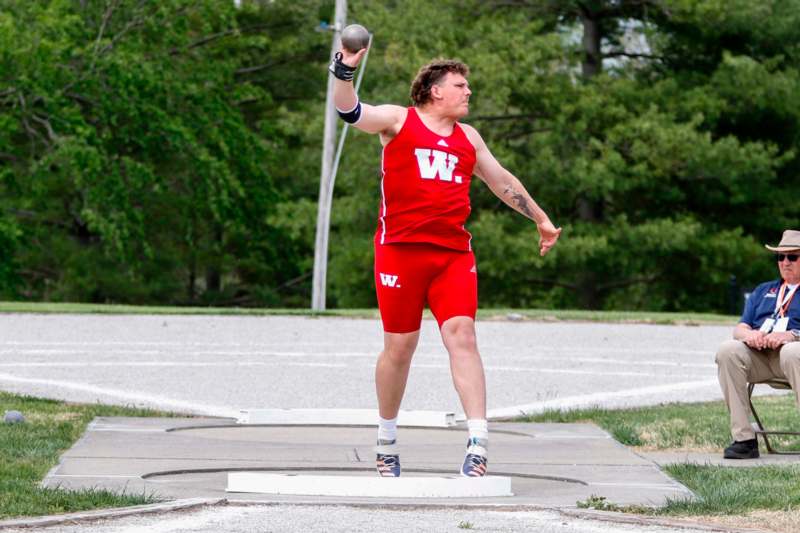 a man throwing a ball