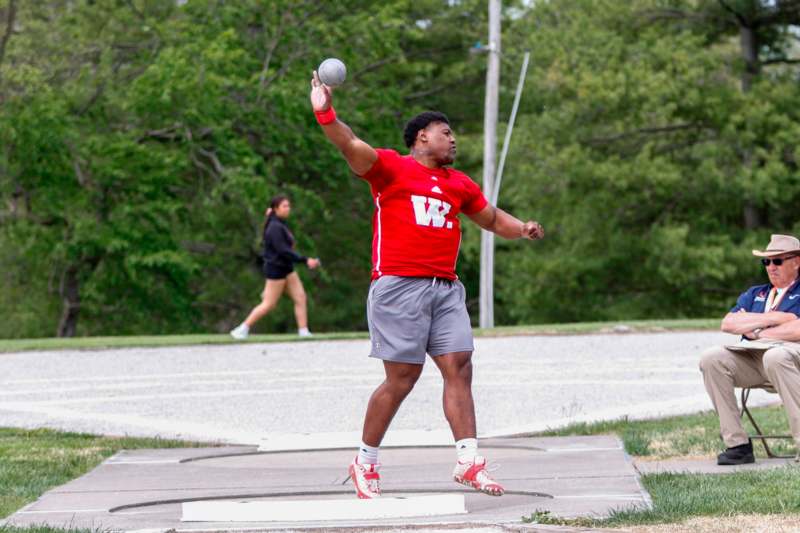a man throwing a ball