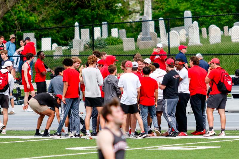 a group of people on a football field