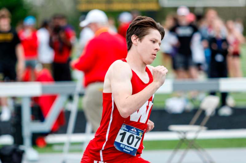 a man running in a race