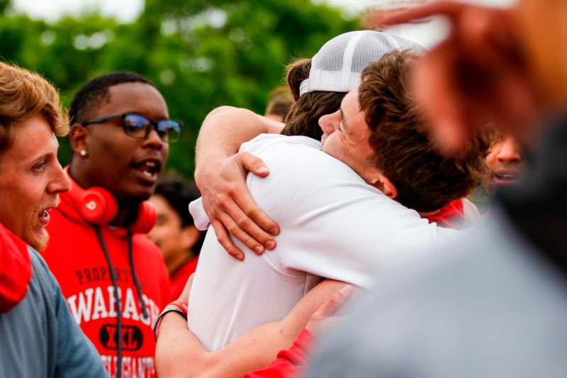 a group of people hugging